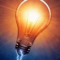 lightbulb with electricity and jigsaw puzzle
