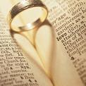 close up wedding ring in dictionary focus love