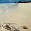 Message in a bottle on beach