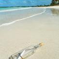 Message in a bottle on beach