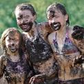 girls covered in mud