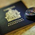    <br />passport with compass on map