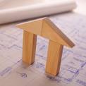 House blueprints with wooden block house