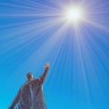 man reaching for the stars