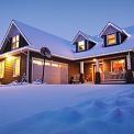 house in winter with fresh snowfall