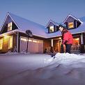 man shoveling snow off driveway