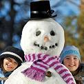 Two girls with snowman