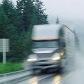 blurred transport truck in the rain