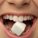 Sugar Cube between Teeth