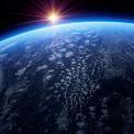 sun over Earth from space