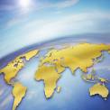 golden world map on blue with sun