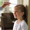 young girl being measured